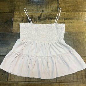 Super cute flowy tank! Size large.
